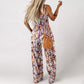 ⏳ Begrenset tid 50% avslag! 🍀Ermeløs jumpsuit med casual trykk for kvinner(Jo mer du kjøper, jo høyere rabatt)