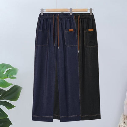 Bukser med snøring, høyt liv og rette ben